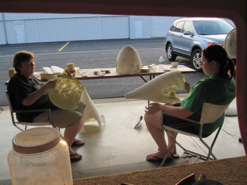 Janice and Renee sanding wheel pants