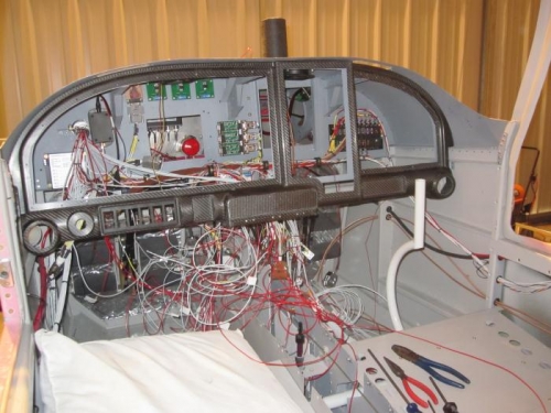 Carbon Fiber Panel back in the fuselage, still have a few wires to hook up on the panel inserts