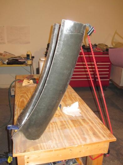 Scoop is vertical to keep the leading edge flat on the table