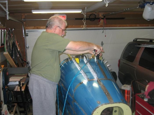 Bob riveting the top tail skin