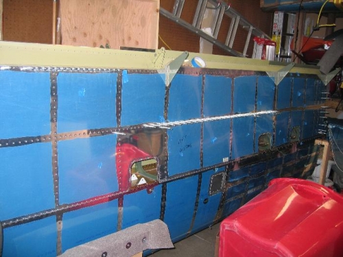 Partial wing skin riveted