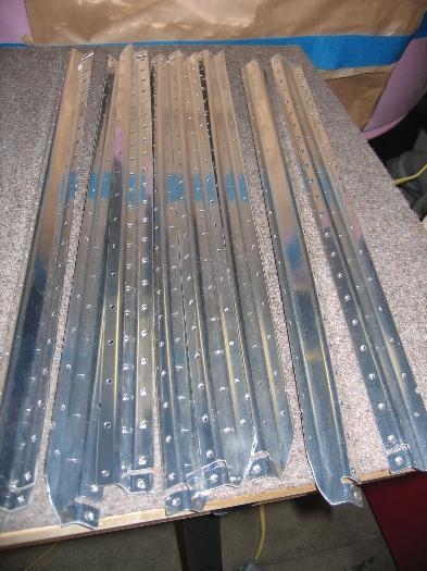 Dimpled rear floor stiffners