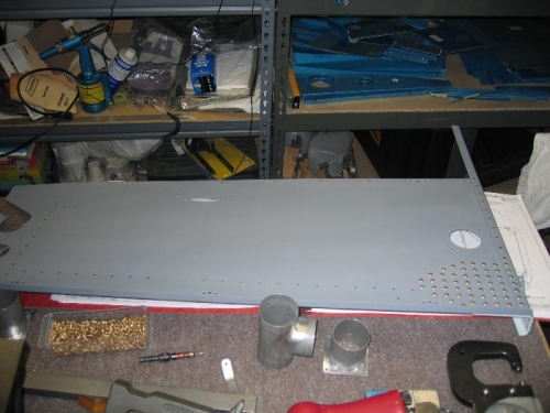 The front rib assembly partially riveted