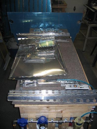A large stack of parts to debur
