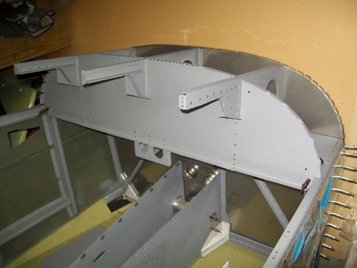 Upper fuselage panel assembly cleco'd into the fuselage