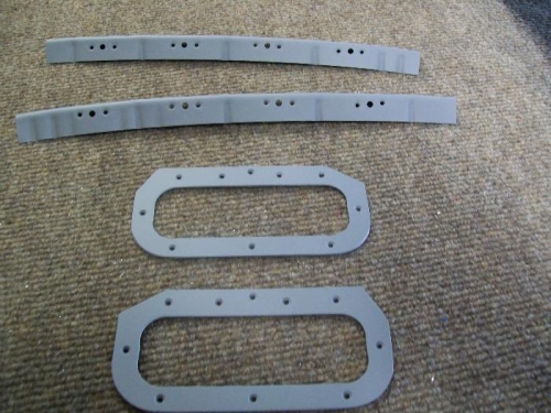 Hand hold doublers and panel attach flanges primed