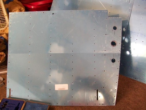 Holes drilled in the right seat pan