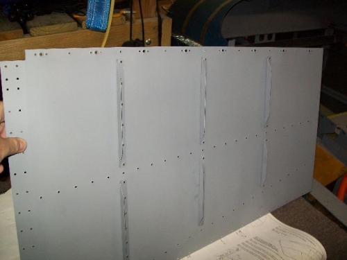 Right baggage floor stiffners riveted