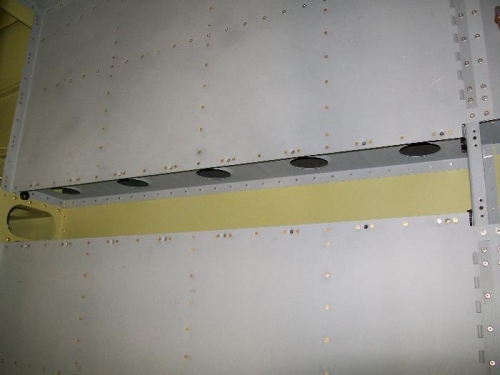 Nutplates and rivets set on the tunnel