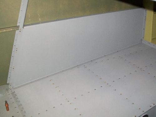 Right baggage cover primed and installed