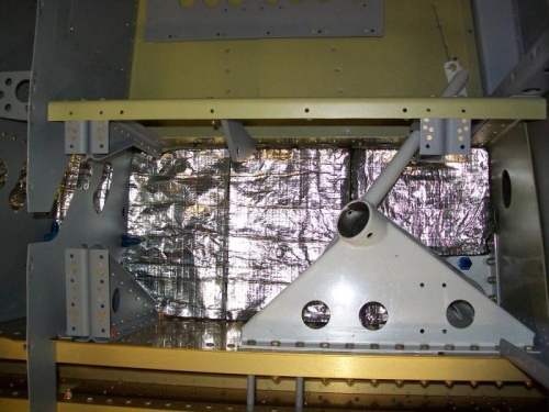 Under the front seats insulated