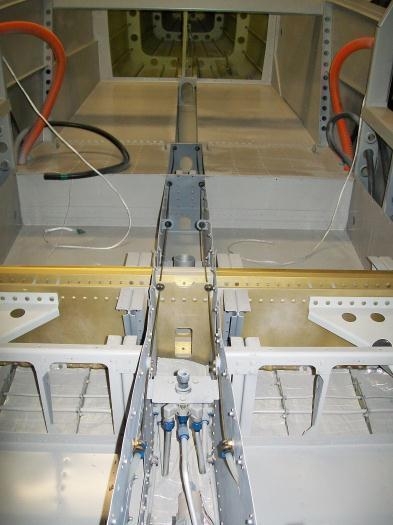 Rudder cable in the tunnel looking aft