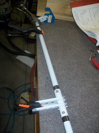 Flap torque tube clamped to the work table