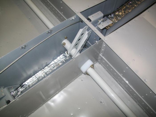 Flap crank and bushings installed