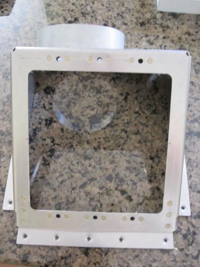 Assembled oil cooler mount
