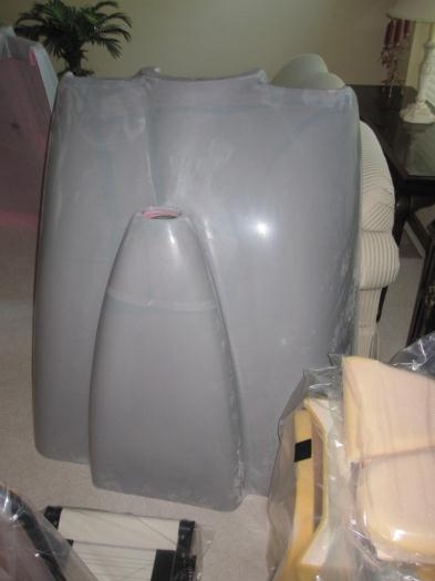 Gray primer on the pink cowl