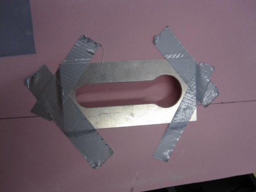 Cutting the handle opening with a template