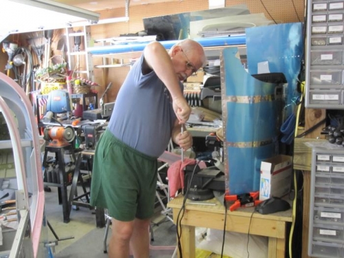 Tapping the door pin rods