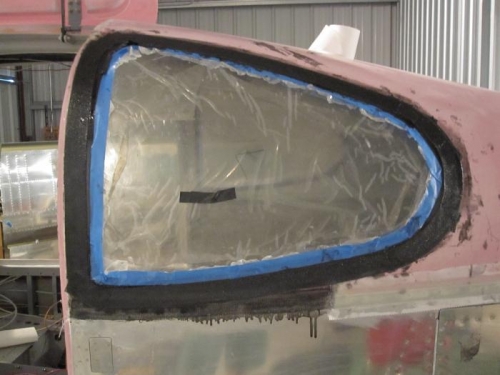 Fiberglass around the rear windows