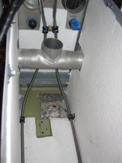 Brakes lines run through the tunnel