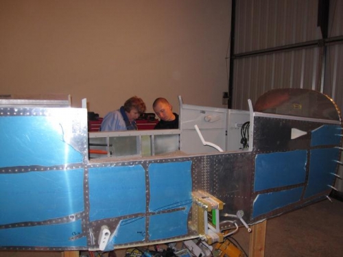 Janice and Brad inspecting the fuselage
