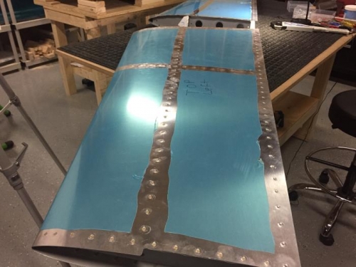 HS-702 riveted to skin