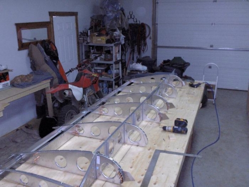 Securing the skeleton to the bench ready for the top skin