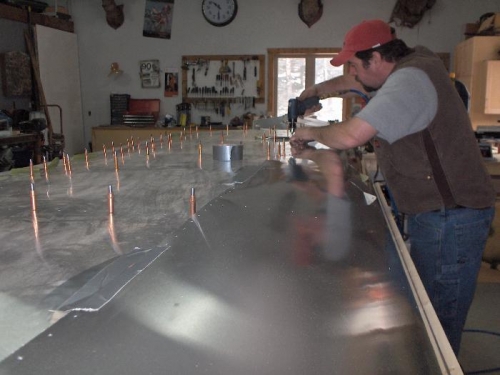 Duct tape really helps as a 2nd pair of hands