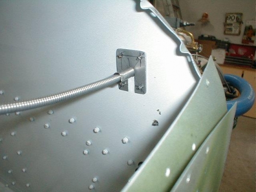 Slot and clamp working to hold the cable