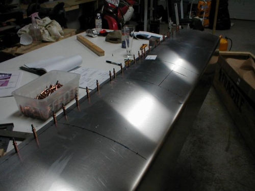 Started at the rear spar