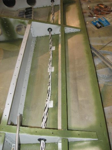 Grouped the wires and ran through the ribs