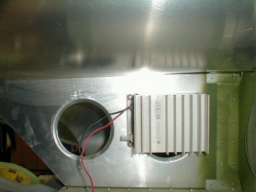 Mounted in the wing tip accessible through an access panel