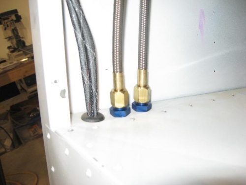 Bulkhead fittings used through baggage compartment