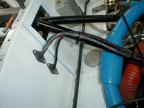 Showing the wiring harness coming through the firewall.