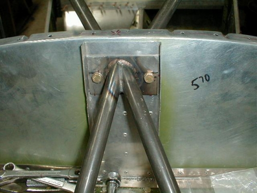 Top Bracket. I did cgange these to larger bolts