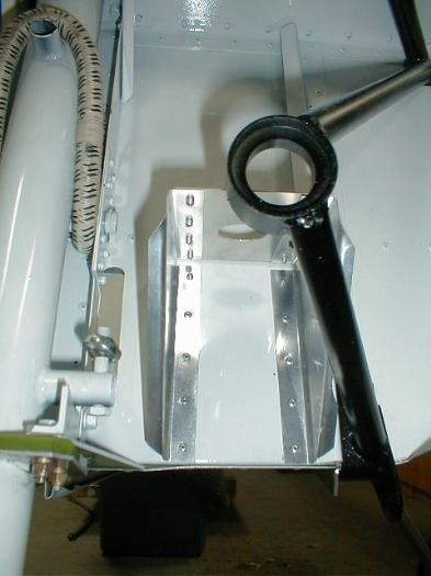 Cut bracket to allow for engine bracket