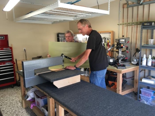 Jay and I dimpling the skins.  He's doing the dimpling and I'm holding the skin.