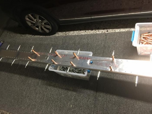 Spar web doubler clecoed in place for final drilling to web.