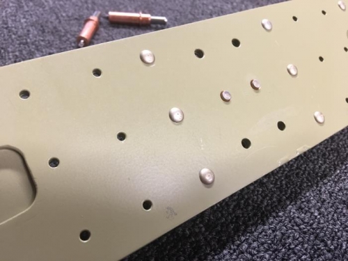 Sorta kinda double flush riveted.  It's not pretty, but it's structurally acceptable.