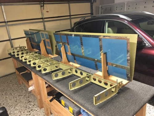 Front spar and ribs ready to be set into the skins for final riveting.