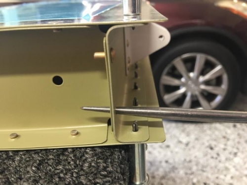 A drift pin helped me get the rivet head to lay flat against the rear spar web.