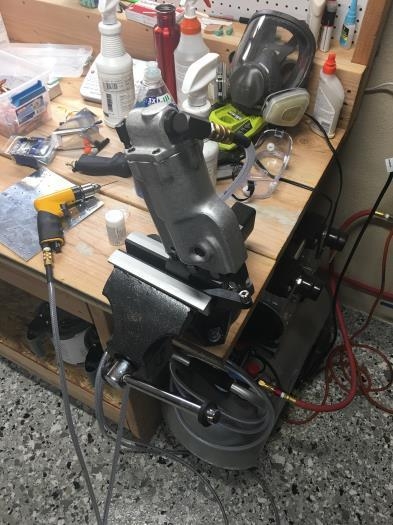 Clamping the pneumatic squeezer in a vise made this job easier.