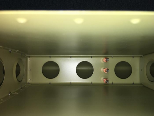 The clecos are where one of the internal nose ribs attaches to the front spar with blind rivets.