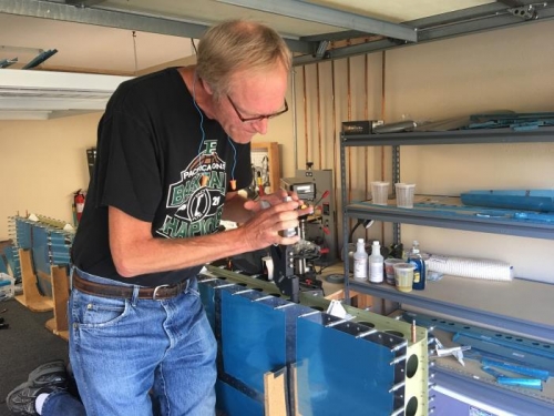 Jay is installing the blind rivets for the interior inspar ribs to the rear spar.