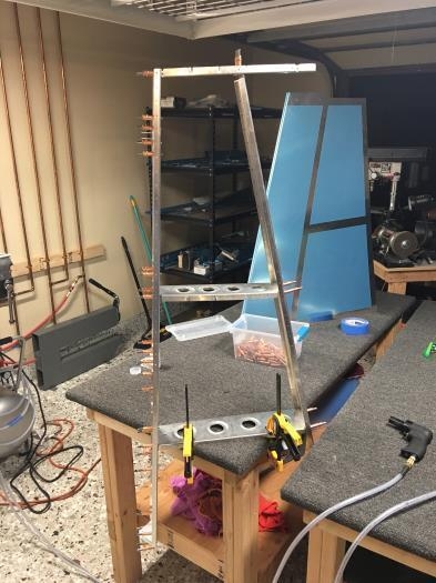 Final match drilling of the vertical stabilizer support structure.