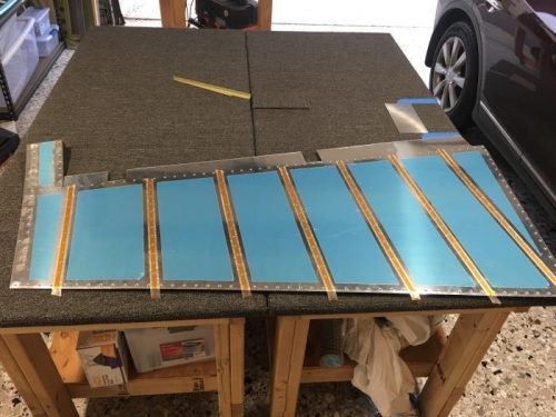 Rivets set in place and rivet tape placed over the manufactured heads.