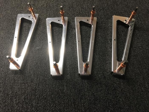 Cut, deburred and temporarily fastened together.