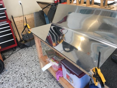 Deburr skins.  Clamping them down makes it easier to work the edge with a vixen file.