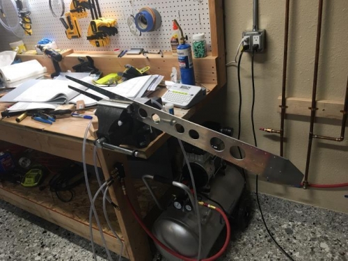 Deburring the rear spar doubler.  It's a thick (0.125 in.) part and needs lots of work.