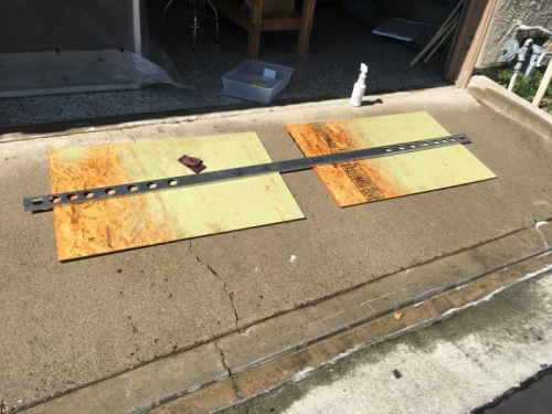 Washing and abraiding a spar with Prekote. It's very tiring doing parts prep this way.